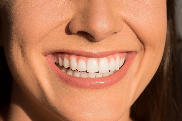 Four Reasons Why You Should See Your Dentist To Treat Your Gum Disease