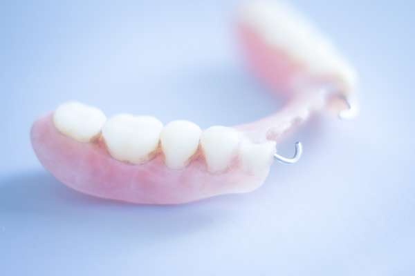 Should I Get Dentures or Dental Implants from Aesthetic Dentistry of Noe Valley in San Francisco, CA